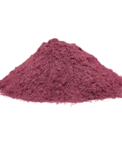 A close-up of vibrant Brazilian Mimosa root bark strips showing rich purple and deep reddish-brown inner fibers.