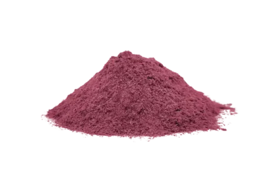 A close-up of vibrant Brazilian Mimosa root bark strips showing rich purple and deep reddish-brown inner fibers.