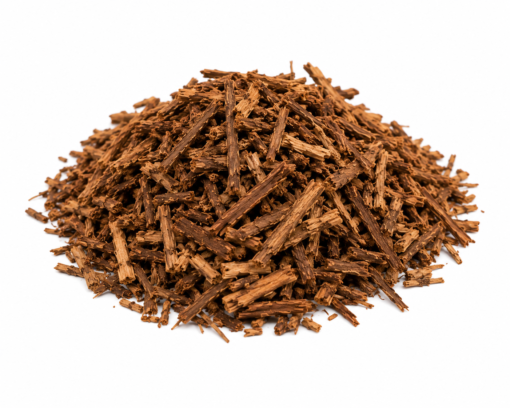 A close-up of coarsely shredded Acacia Acuminata inner root bark displaying rich golden-brown and fibrous textures.